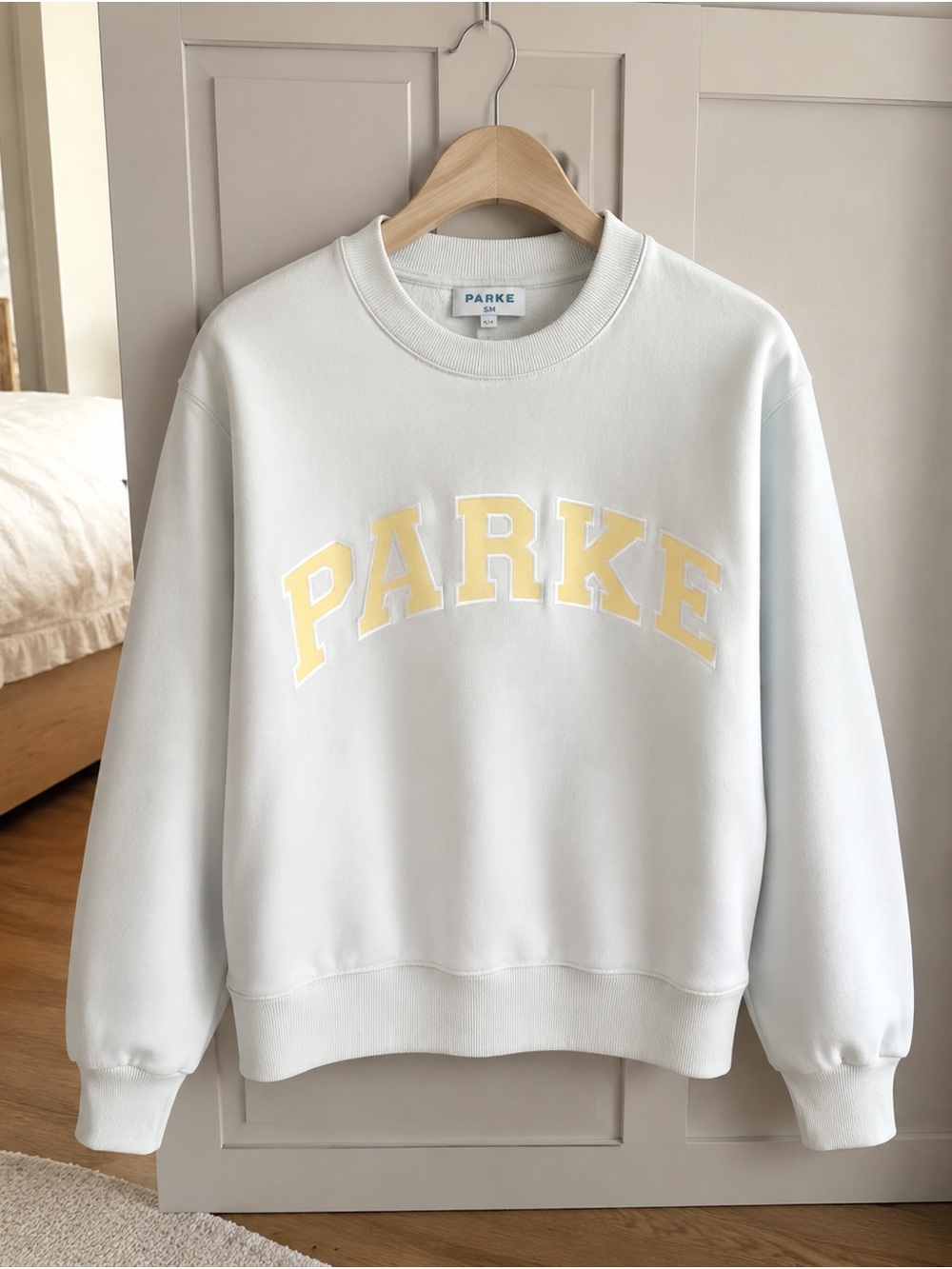 PARKE Crewneck Sweatshirt in Light Blue with Yellow Lettering